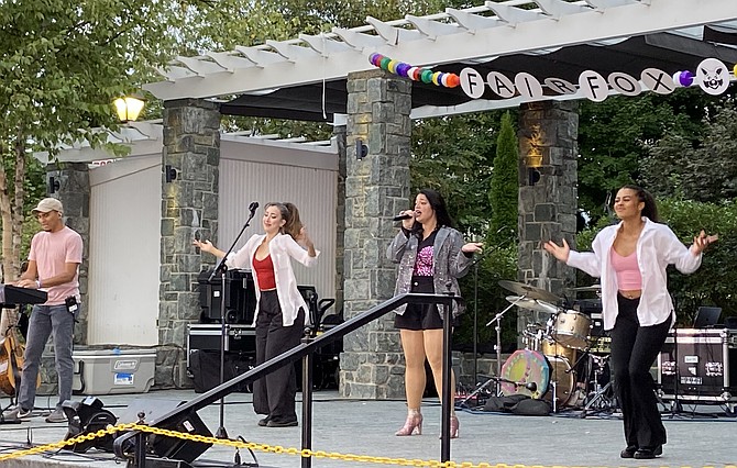 Taylor Swift tribute band, Cruel Summer, wowed the crowd at Fairfax City’s monthly Rock the Block event.Alyssa Coco (with mic) sang a wide range of Taylor Swift’s hits.