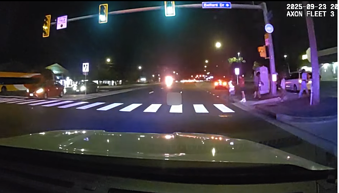 Image of scene leading up to the Fairfax County Police officer involved fatal hit-and-run pedestrian crash in Hybla Valley as viewed during the release of the body-worn camera footage of the incident during the Oct. 23 press conference.