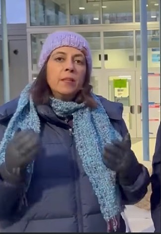 Rachna Sizemore Heizer, candidate for the Braddock District seat on the Fairfax County Board of Supervisors, campaigns outside a poll on Dec. 9.