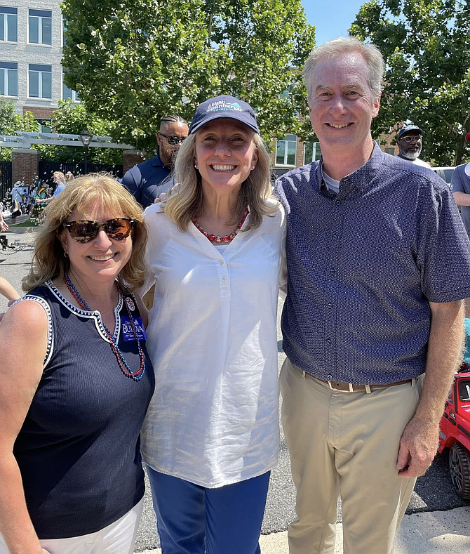 Gretchen and David Bulova pose with Abigail Spanberger (center) during her election campaign in Fairfax.