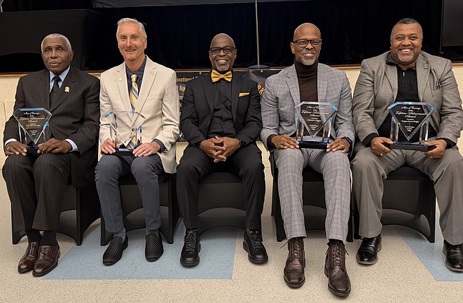 Men of Courage 2025 Lifetime Achievement honorees pose for a group photo Dec. 6, 2025, at the Oswald Durant Center. From left, Col. Jim Paige (ret), Robert Trout, Founder Anthony Suggs Sr., Michael Diggins and Gregory Wright. Not pictured is recipient Bill Euille.