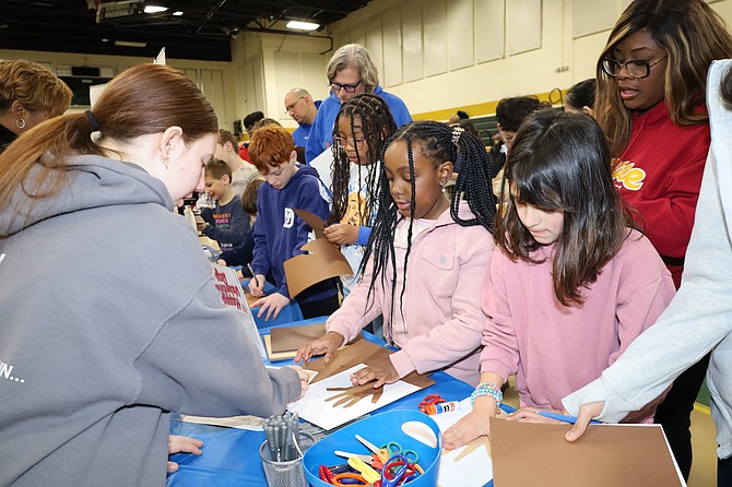 Children create Valentine’s Day cards for Fellowship Square residents during Volunteer Fairfax’s MLK Jr. Day of Service, Monday, Jan. 19.
Photo by Patricia Medeiros/Volunteer Fairfax