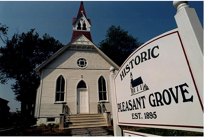 The photograph of Historic Pleasant Grove is by Pleasant Grove descendant and Pulitzer-Prize nominated White House photographer Bernard Boston, 1933-2008. He is laid to rest in Pleasant Grove Cemetery.
Photo courtesy of Michelle Arcari Rose, board president of The Friends of Historic Pleasant Grove