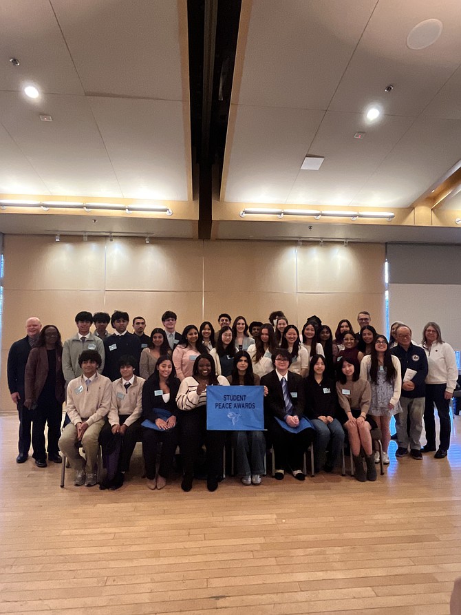 The 2026 Student Peace Awards recipients of Fairfax County gather for a group photo during a reception honoring their achievements at the Sherwood Community Center in Fairfax on March 1.