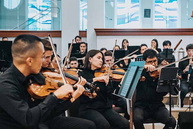 Musicians with the Great Falls Philharmonic, an orchestra featuring performers from across the Washington metropolitan area, perform during a concert on Aug. 23, 2025. Photo by Caren Hoehner
