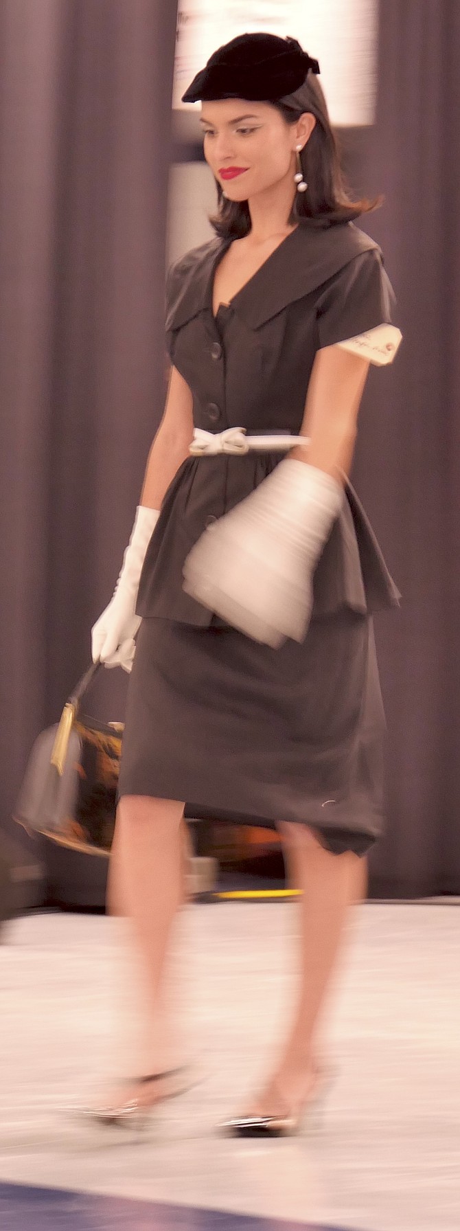 50s church attire — conservative with hat and gloves.