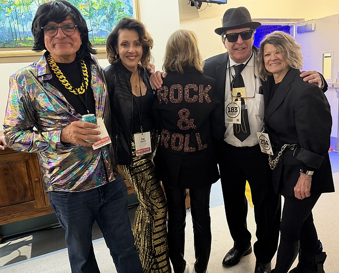 Owner Rob Van de Graaff, right, and Executive Chef Steve Kim outside The Commodore, the self-described “five-star dive bar” at the March 12 grand opening at 220 N. Lee Street in Old Town.