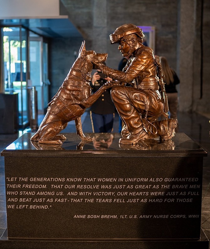 The Bonds of Service event took place at Arlington National Cemetery, at the Military Women’s Memorial, home to The Pledge, a life-sized bronze statue of a female servicemember and her dog, which sculptor Susan Bahary was commissioned to sculpt in 2020.
