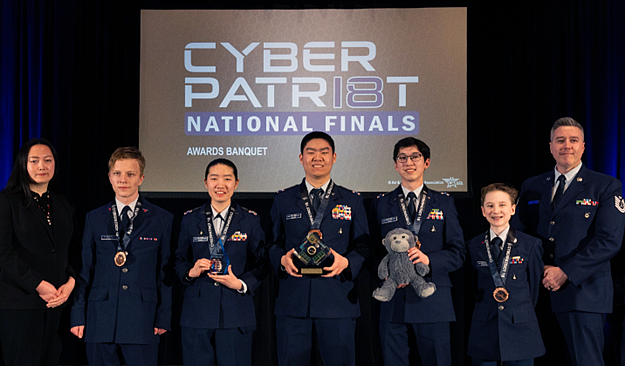 The Burke Composite Squadron Team was awarded second place in the CyberPatriot All Service Division and third in the Cisco Networking Challenge All Service Division March 23 in Bethesda. From left, 2d Lt Caroline Ren, Cadet A1C Illia Shestiuk, Cadet Capt Zhang, Cadet Lt Col Zhang, Cadet 1st Lt Taiyo Lloyd, Cadet MSgt Holden Donohue, and TSgt Jonathan Groff.
Photo by Jud McCrehin, Air & Space Forces Association