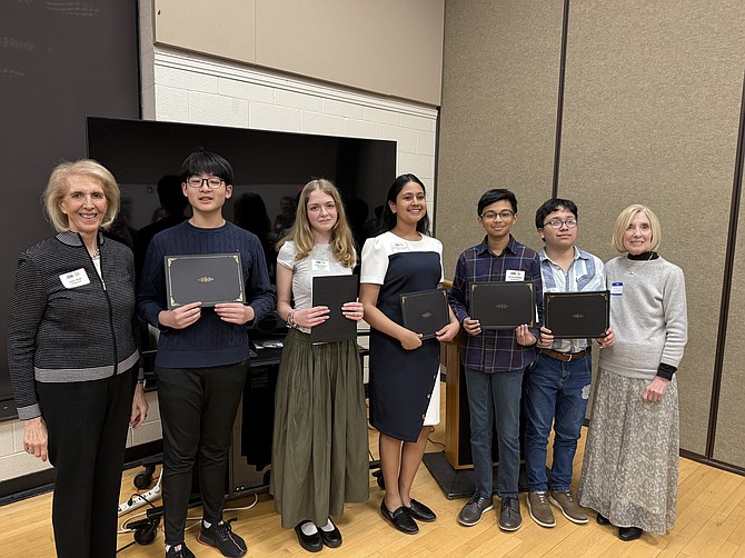 Shown at the annual AAUW McLean Area Branch potluck dinner recognizing the winners of the STEM Essay Contest are, left to right, Judy Page, STEM Chair; Bowen Wu; Aleksandra Bidenko, 1st Place Winner; Ridheema Dusange, Zafyr Rahman, Mario Fernandez Granda, and Myrtle Hendricks-Coralles, STEM Essay Contest Steering Committee member.
