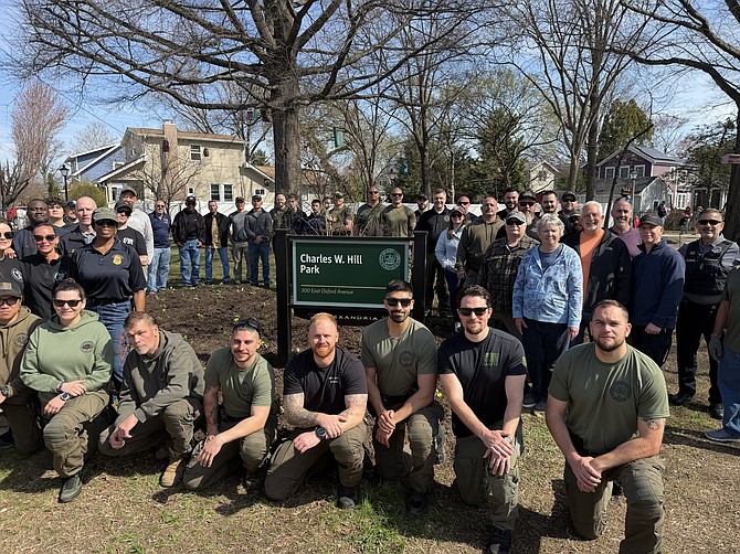 Alexandria Police Department retirees gather with volunteers for the annual Charles Hill Park clean up March 22 in Del Ray.