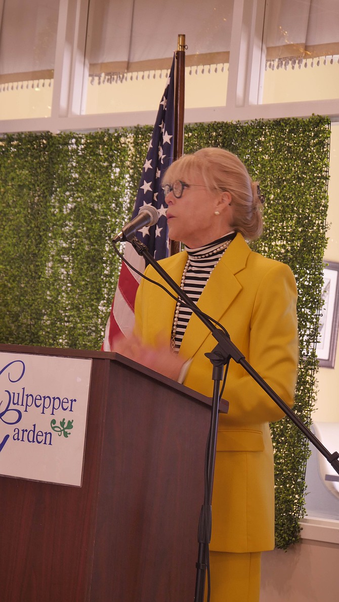 Culpepper Garden Executive Director Marta Hill Gray addresses the roomful of first responders on March 18.