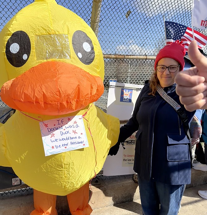 Miranda Thomas, 8, and her mother Claire, of Annandale, used a duck to emphasize their message and added, “ We want everyone to follow the rules [the Constitution], and protect our neighbors.”