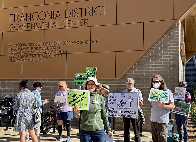 Bikeway opponents made their presence known at the Franconia Government Center ribbon cutting on Saturday, April 11.