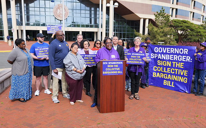 Members of SEIU Virginia 512 rally outside the Fairfax County Government Center on May 6, 2026, to urge Gov. Abigail Spanberger to sign House Bill 1263.