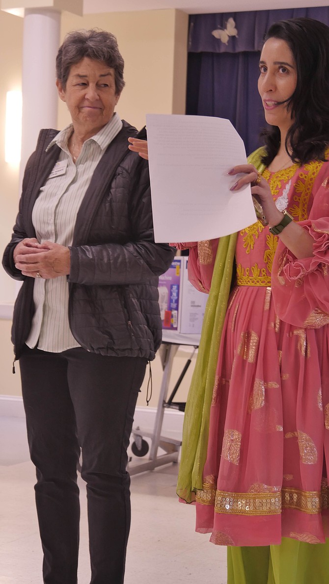 Dr. Janine Howard, lead pastor at Fairlington United Methodist Church (left) and Ms. Forozan Mirwais, instructor of Alexandria sewing classes for refugee women.
