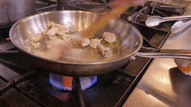 Sautéing marinated chicken breast