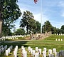 U.S. Flags adorn the graves of more than …