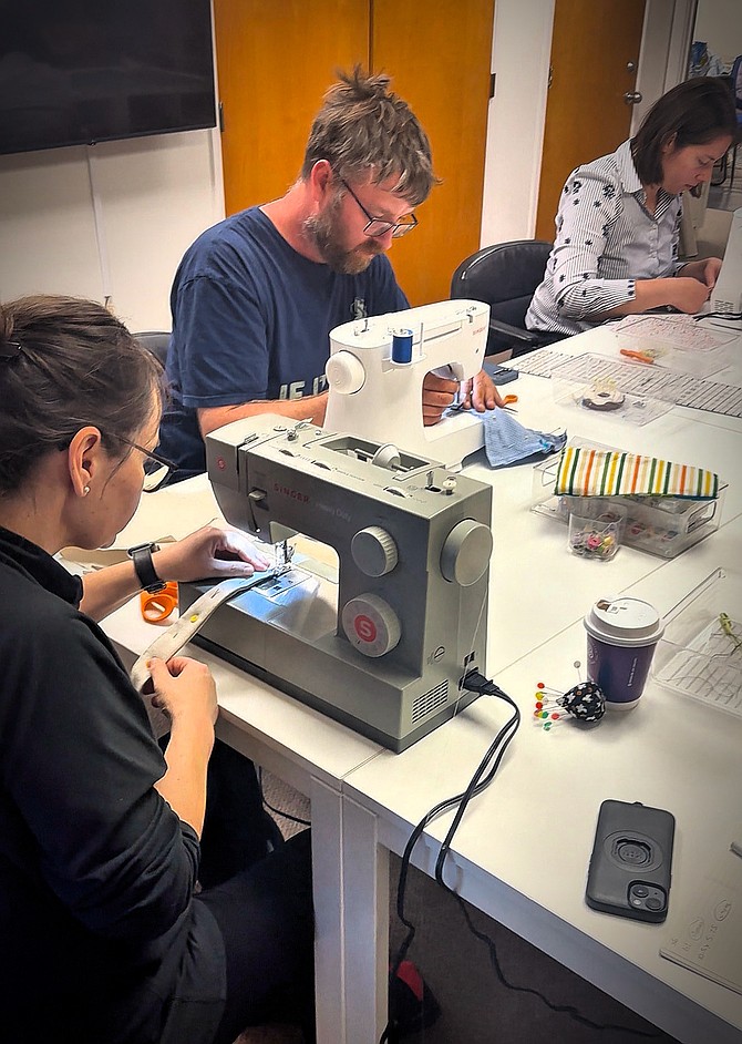 Inside the lab, much sewing and much learning.