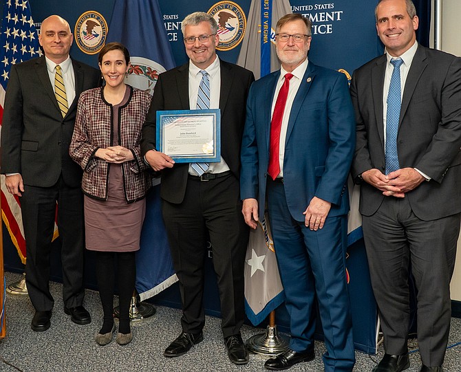 From left, Assistant U.S. Attorney Jonathan Keim, Assistant U.S. Attorney April Russo, Detective John Bamford, Executive Assistant U.S. Attorney Frank Bradsher, and Criminal Chief Seth Schlessinger.
