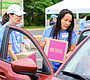 Volunteers from Starkist, headquartered in Reston, distribute resource …