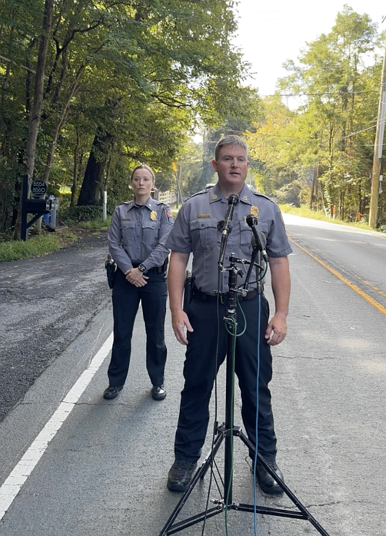 Capt. Jason Chandler, commander of the Fairfax County Police Public Affairs Bureau, answers questions during a news briefing at the scene of a fatal stabbing in McLean on Aug. 17.